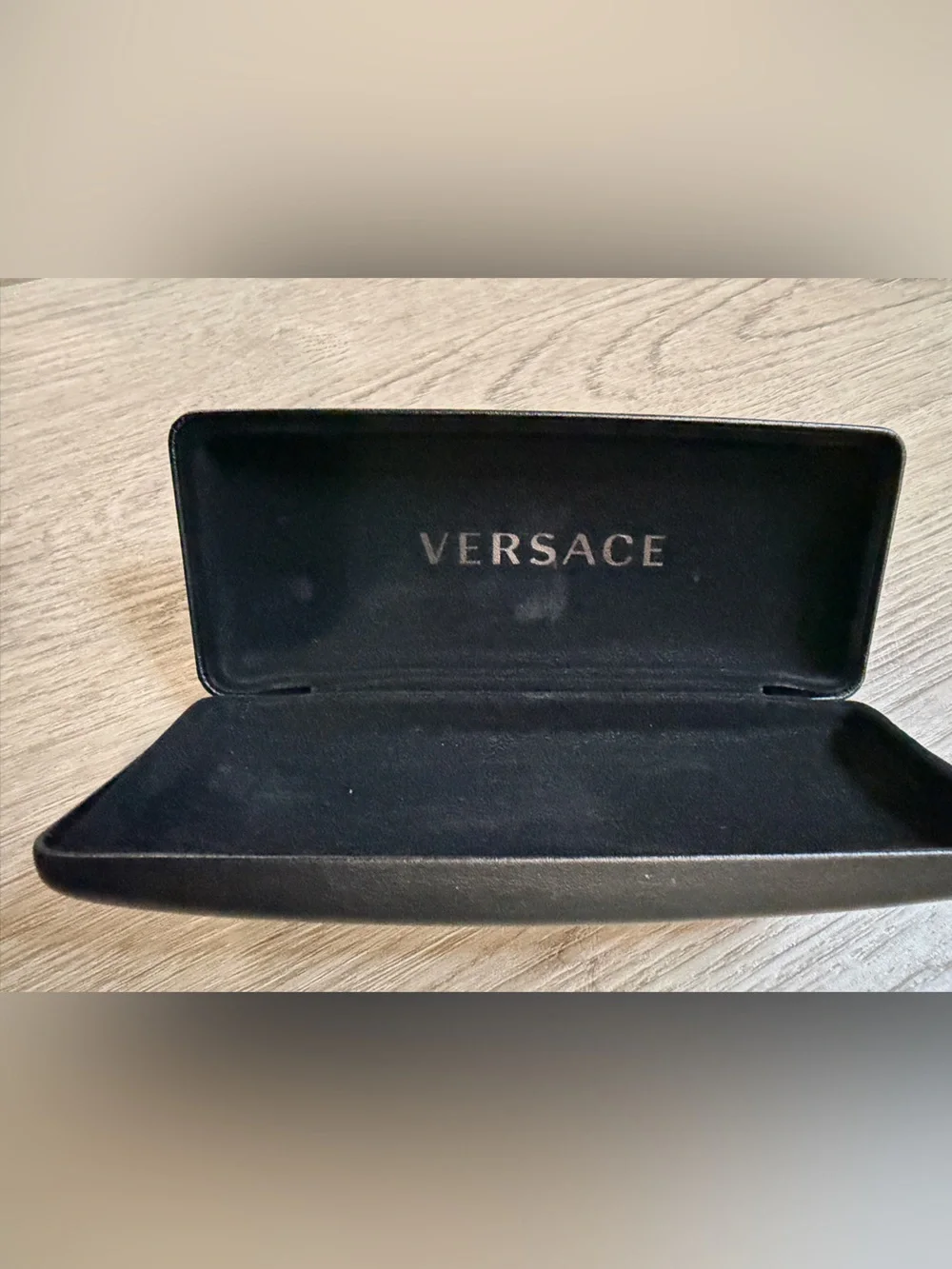 Versace Black Case with Gold Lettering